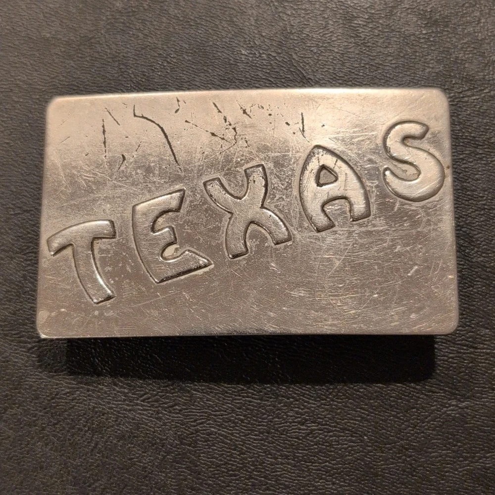 Texas Belt Buckle. Texas In Raised Letters. Priced Low Due To Scratches